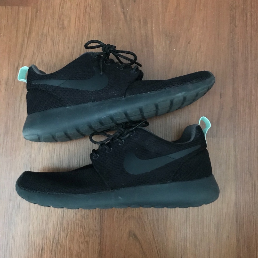 Black Nike running shoes